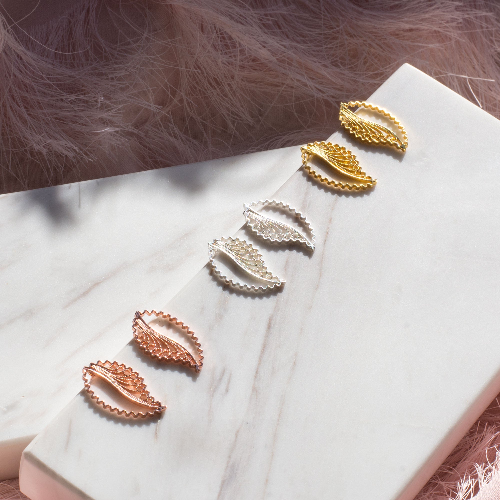 Aretes Topos en filigrana momposina elaborados en plata con chapado en oro de 24k y oro rosa